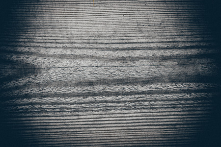 wooden plank with splinters and cracks. Vintage photography effect. Retro grainy color film look.の写真素材