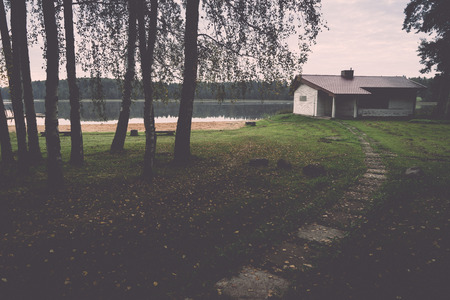 Majestic country landscape under morning sky with clouds. - retro, vintage style lookの写真素材