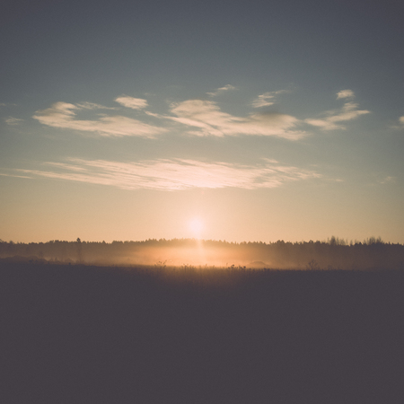 beautiful misty meadow in the morning frost in country - retro, vintage style lookの写真素材