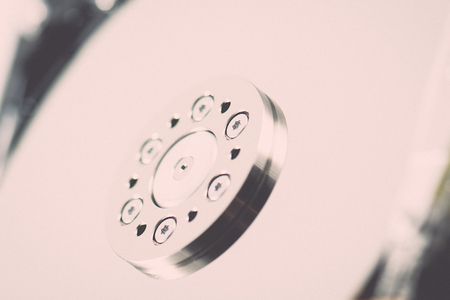 computer hard disk drive close-up shot. shallow depth of field. macro - retro vintage effectの写真素材