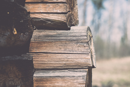 old countryside house wooden wall details and close-up - retro vintage film effectの写真素材