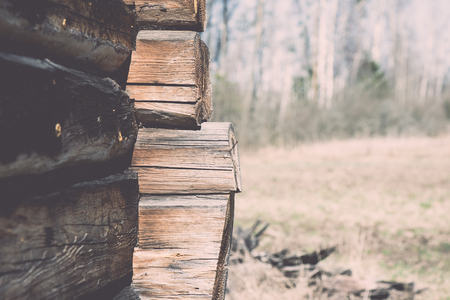 old countryside house wooden wall details and close-up - retro vintage film effectの写真素材