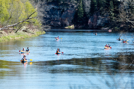 tourists enjoying water sports, kayaking in wild river - Sigulda, Latvia, 2017-05-13のeditorial素材