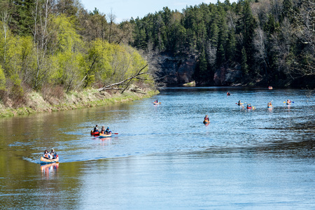 tourists enjoying water sports, kayaking in wild river - Sigulda, Latvia, 2017-05-13のeditorial素材