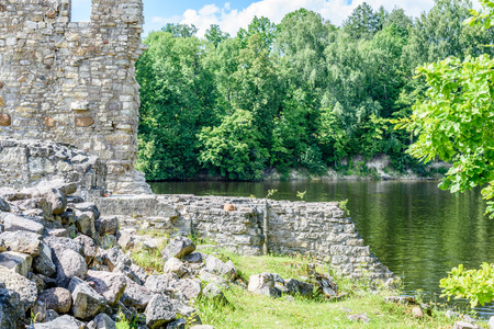 old stone castle ruins in Koknese, Latvia. hot summer dayの写真素材