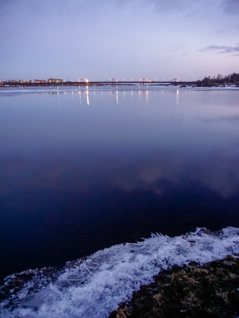 Riga city panorama at night with lights over the riverの写真素材