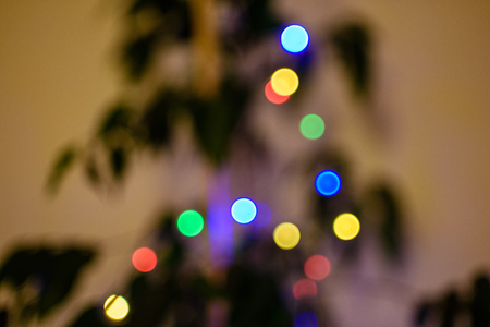 Abstract Festive background. Christmas and New Year feast bokeh background with copyspace. Holiday party background with blurry boke special magic effect.の写真素材