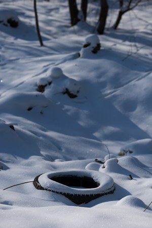 offroad car tires left in the snow trenchの写真素材