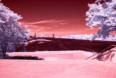 infrared image of river Daugava in RIga with city buildings. modified colorsの写真素材