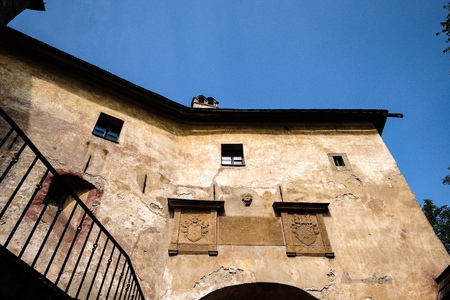 ruins of old abandoned castle on the cliff with bricks and stone. architecture details in Slovakiaのeditorial素材