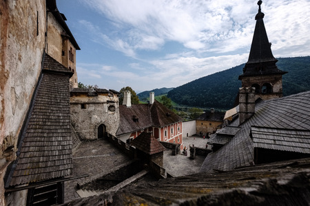 ruins of old abandoned castle on the cliff with bricks and stone. architecture details in Slovakiaのeditorial素材