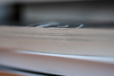 macro image of paper book pages up close. abstract image with bookmarkの写真素材
