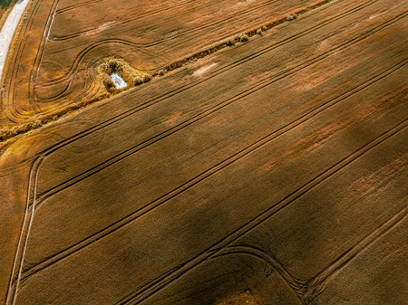 drone image. aerial view of rural area with green cultivated fields in summer day, shadows from clouds - vintage retro lookの写真素材