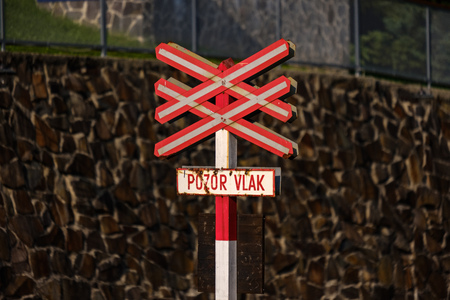 ancient log wood railway and train on the tracks. tourist attraction train in slovakiaの写真素材