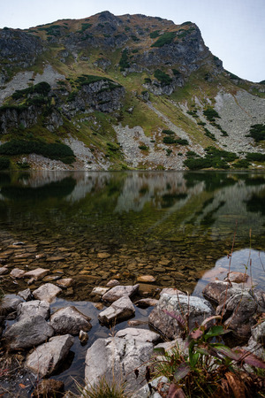 hiking trails in Slovakia Tatra mountains near mountain lake of Rohache. clear autumn dayの写真素材