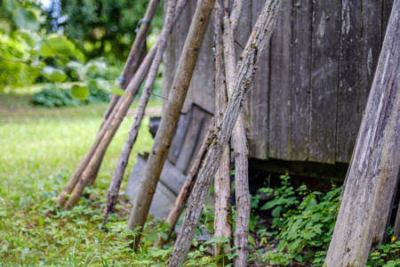 old wooden barn details in countryside at summer with old planks and metal detailsの写真素材