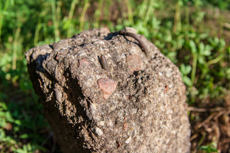 large granite rock single in nature environment isolated from otherの写真素材