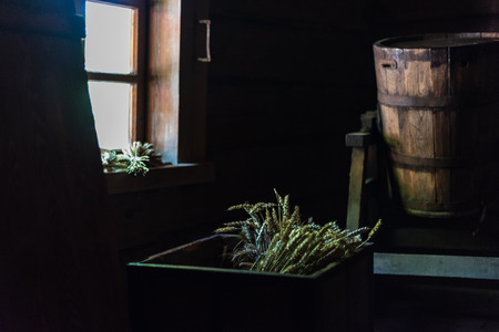 old country side house interrior with hand working tools. dusty roomの写真素材