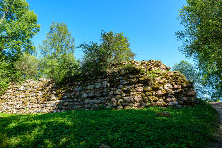 stone brick ruins of old building walls in green countrysideの写真素材