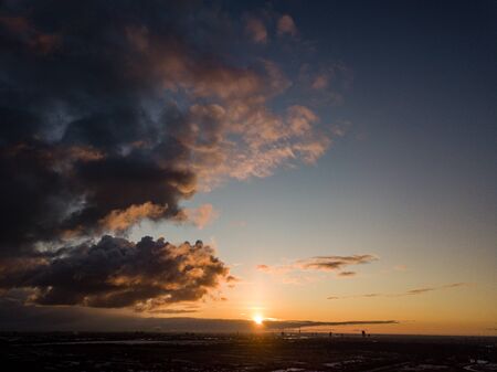 dramatic winter sunrise over city of Riga in Latvia. aerial drone imageの写真素材