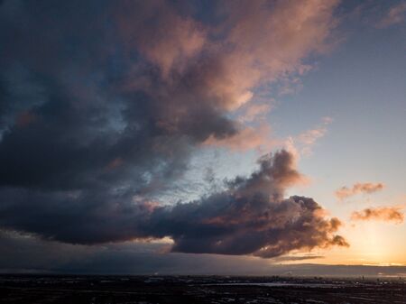 dramatic winter sunrise over city of Riga in Latvia. aerial drone imageの写真素材