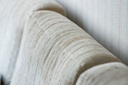 couch details in apartment with blanket