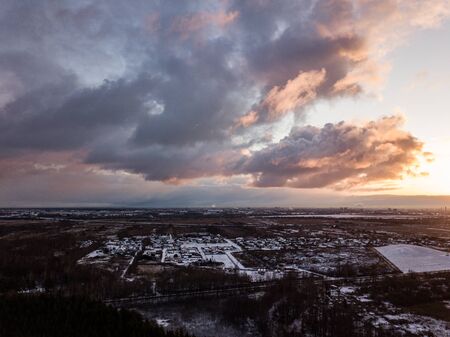 dramatic winter sunrise over city of Riga in Latvia. aerial drone imageの写真素材