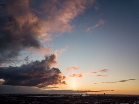 dramatic winter sunrise over city of Riga in Latvia. aerial drone imageの写真素材