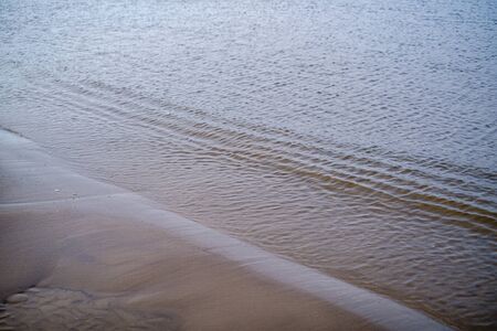 beach sand texture with water. abstract patternの写真素材