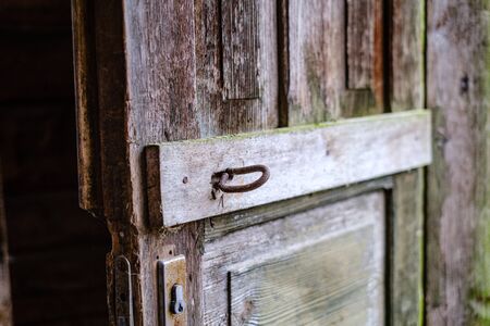 old abandoned house interior with broken furniture and empty windows. woodwork details in dustの写真素材