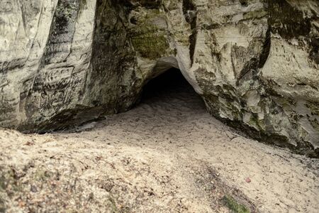 sandstone cliffs on the river shore. Gauja river in Latviaの写真素材