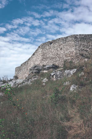 ruins of old abandoned castle on the cliff with bricks and stone. architecture details in Slovakia - vintage retro lookのeditorial素材