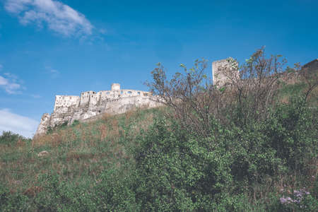 ruins of old abandoned castle on the cliff with bricks and stone. architecture details in Slovakia - vintage retro lookのeditorial素材