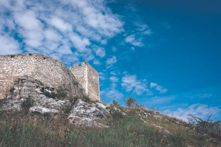 ruins of old abandoned castle on the cliff with bricks and stone. architecture details in Slovakia - vintage retro lookのeditorial素材