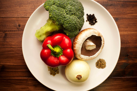 Freshly gathered root vegetables from the garden ready for the cooking potの写真素材