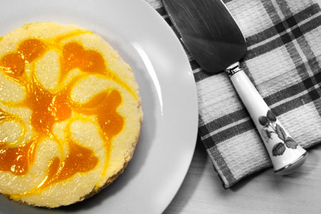 Newly made Lemon Cheese Cake placed on kitchen table ready to serve guestsの写真素材