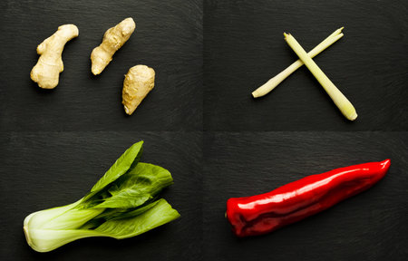 Four Chinese ingredient on black slate surfaceの写真素材