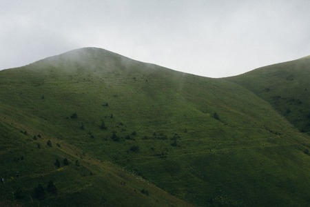 Foggy Landscape. View From Mountains to the Valley Covered with Foggy.