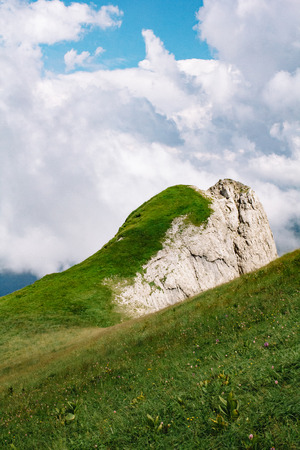 Beautiful summer mountain landscape with cumulus clouds and a sunny day.の写真素材