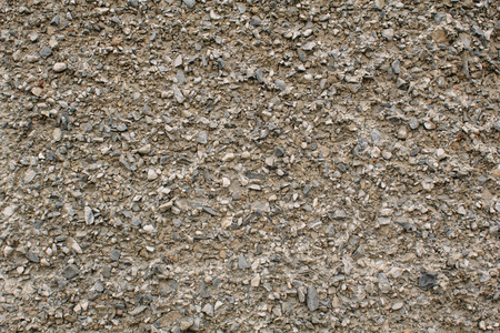 Abstract texture of a gravel wall with cement backgroundの写真素材