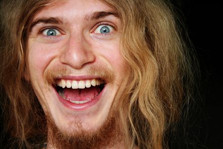 A portrait of a man who is funny smiling. He is in good mood :)の写真素材