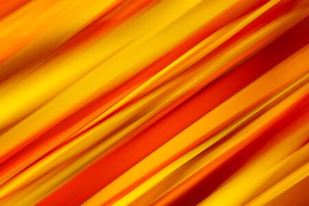 Abstract red and yellow striped background in motion blurの写真素材