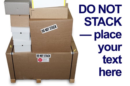 Stacked boxes with stickers saying "do not stack"の写真素材
