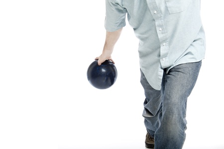 bowler throwing a blue marbled bowling ball isolated on whiteの写真素材