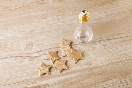 Table photo with light bulbの写真素材