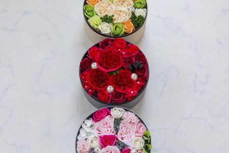 a bouquet in a round box