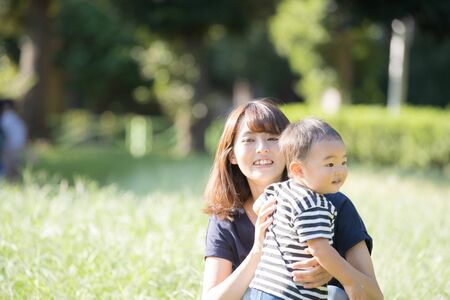 Parent and child in the park (2-year-olds)