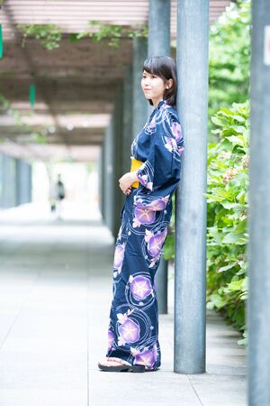 A young woman in a yukataの写真素材