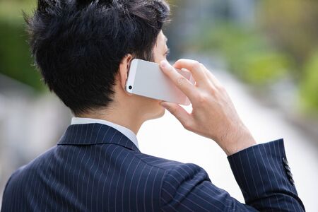 Businessman using smartphonesの写真素材