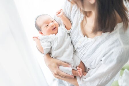 Newborn (0 years 0 months) and mother